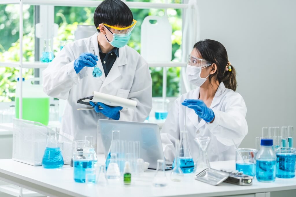 researcher working in laboratory for medicals science research using scientific equipment technology